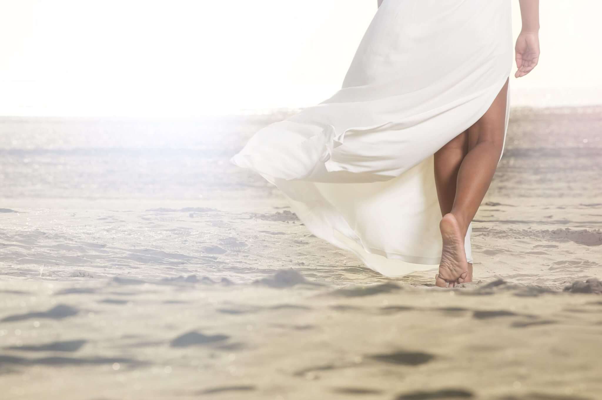 African Girl Walking on Sand
